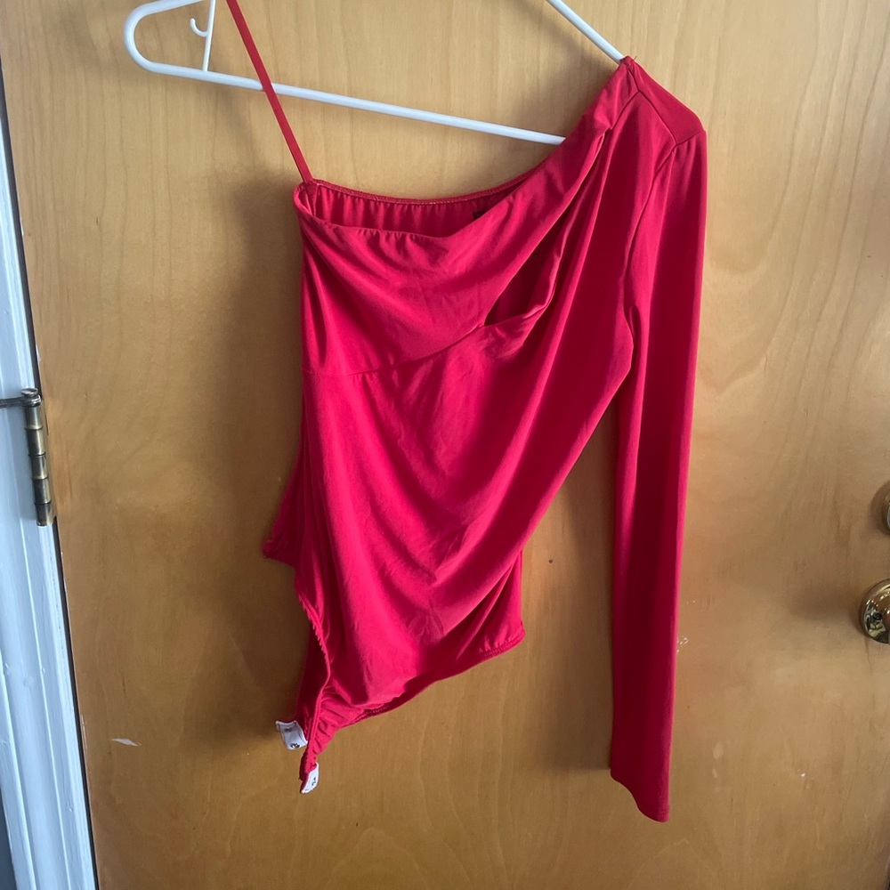 One sleeve cut out red body suit